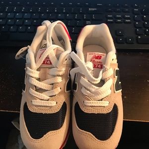 Brand new with tags  New Balance 574.  Boys (toddler) size 11